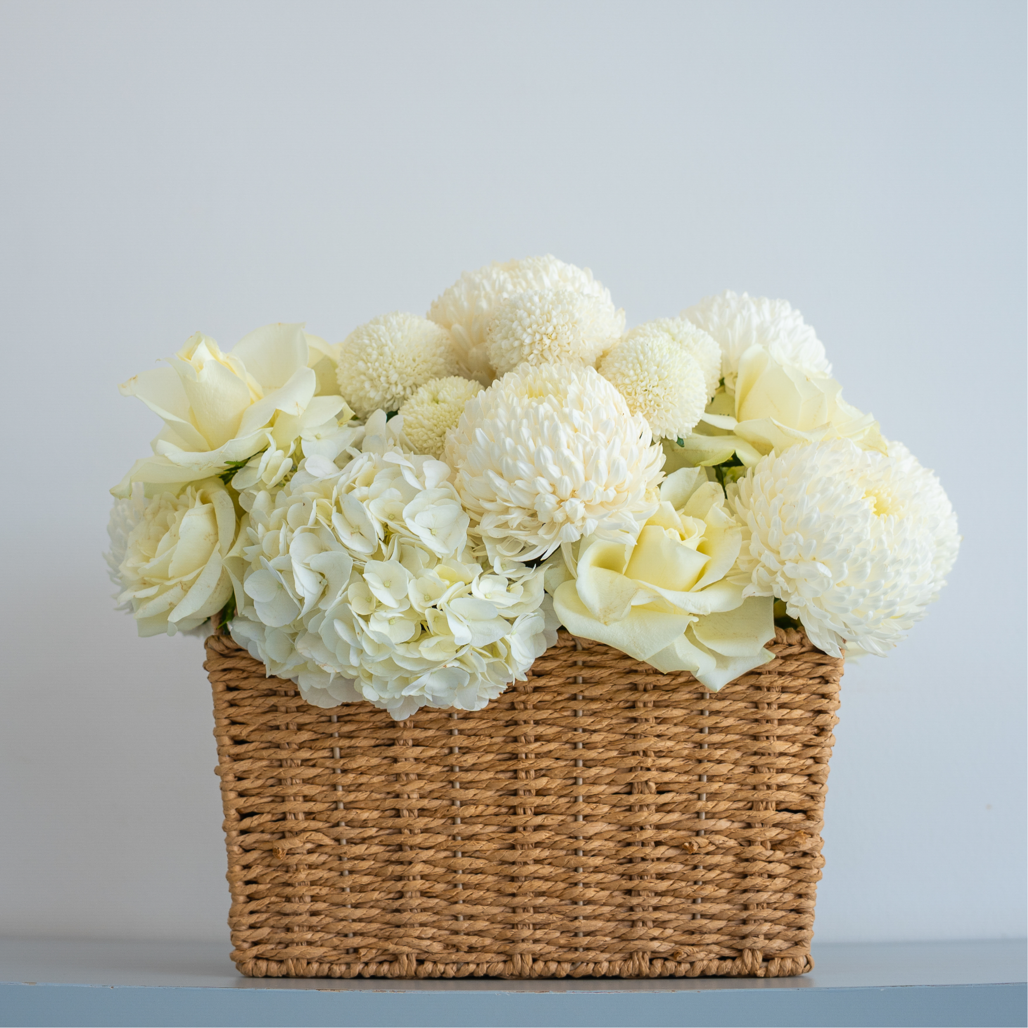 Pure Whisper – All-White Floral Basket